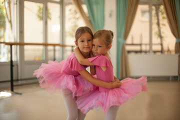 Little ballerinas in ballet studio