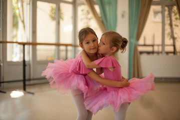 Little ballerinas in ballet studio