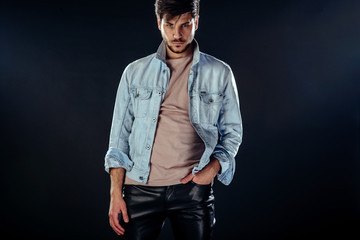 Fashion man posing in studio