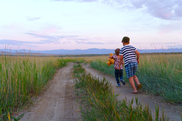 boy running in field