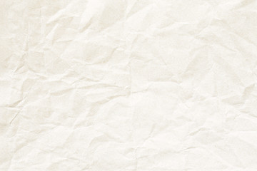 Old pale yellow crumpled paper background texture