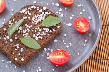 Whole grain organic bread with sea salt and basil