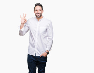 Young business man over isolated background showing and pointing up with fingers number three while smiling confident and happy.