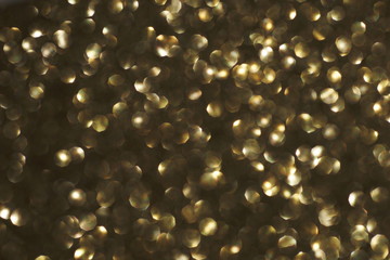 blur glitter, bokeh, defocused gold festive background,  texture. Xmas abstract background .