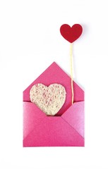 Envelope with love hearts letter isolated on white background.