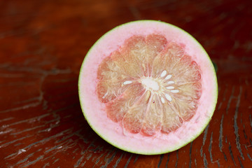 pomelo on table wood.
