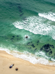 Gyeongpo Beach, Gangneung, Gangwon Province, South Korea - Yellow sand beach and clear beautiful green blue water taken from air. Silver wave. Holiday. Vacation. Trip. Resort. Summer. Relax. Rest.