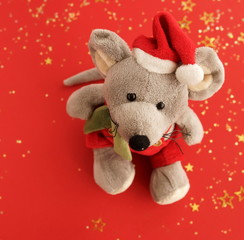 Christmas background.  Xmas rat, mouse toy, symbol chinese happy new year 2020. Close up mouse toy in santa claus red hat and new year decorations. horoscope sign 2020. Copy space