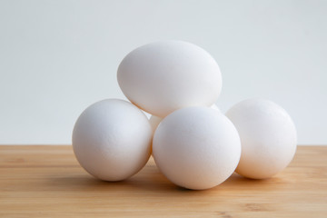 Chicken eggs for cooking. White and brown eggs.
