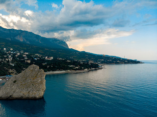 Obraz premium View from the sea to the mountains and clouds, Crimea.