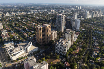 Aerial view of partment towers, streets and homes along the Wilshire Blvd in West Los Angeles, California.