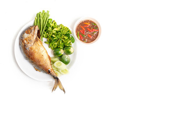 Fried mackarel with shrimp-paste sauce on white background with copy space