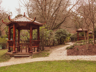 Chinese pavilions in Asian themed garden on a cloudy winter day in Mount Dandenong