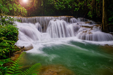 Fototapeta na wymiar Beautiful nature waterfall in Kanjanaburi, Thailand (Huai Mae Khamin Falls) and forrest