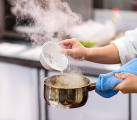 Chef cooking food in the kitchen, Chef preparing food