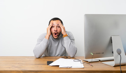 Telemarketer Colombian man with surprise expression