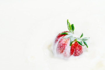 juicy strawberries in milk, falling strawberries