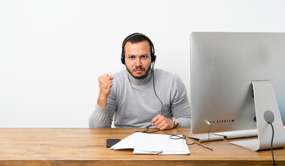 Telemarketer Colombian man with angry gesture