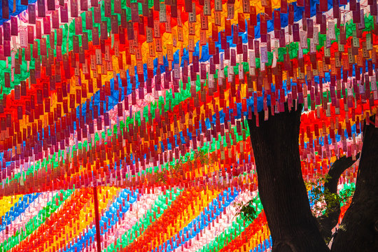 South Korean religious lanterns adorning a buddhist temple of Jogyesa in Seoul hanging in the air.