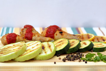 grilled chicken, zucchini and lemon, bright background, side view
