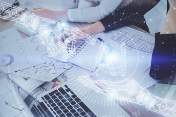 Double exposure of woman's writing hand on background with data technology hud. Big data concept.