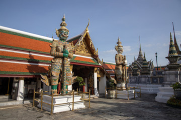 Fototapeta premium Giant Demon Guardian Standing in Front of Wat Phra Kaew (Grand Palace) Door in Bangkok Thailand