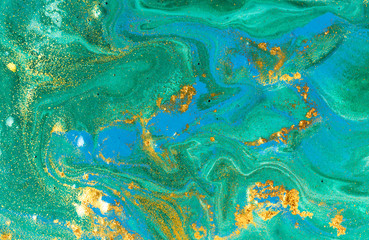 Naklejka na ściany i meble Liquid uneven blue and green marbling pattern with golden glitter and glare of light
