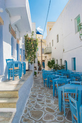 Street view of Chorio village with paved alleys and traditional cycladic architecture in Kimolos island in Cyclades, Greece