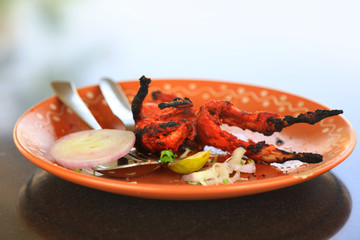 Indian style grilled tandoori quail bird