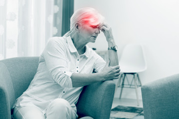 Older woman has a headache