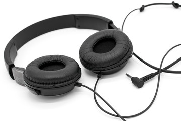 Black headphones on white background