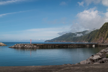 Port and mountains in Povoacao, Sao Miguel, Azores