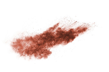 Brown color powder explosion on white background. Colored cloud. Colorful dust explode. Paint Holi.