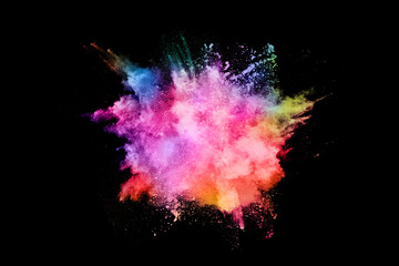 abstract colored dust explosion on a black background.abstract powder splatted background,Freeze motion of color powder exploding/throwing color powder, multicolored glitter texture.