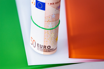 Irish flag with euro banknotes