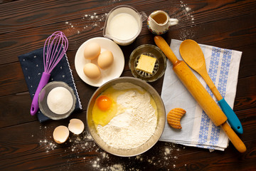 Baking ingredients and tools on wooden tabletop