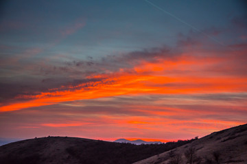 Springtime landscape at the sunset on the hill