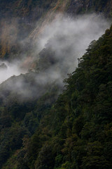 Fototapeta na wymiar Mountains Queenstown New Zealand. Clouds fog