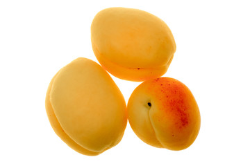 Naklejka na ściany i meble Fresh ripe apricots on a white background, isolated