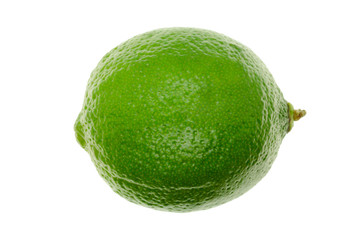 Whole fresh lime isolated, ripe green on white background
