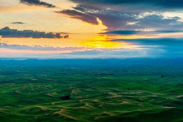 Beautiful and Dramatic Palouse, Washington, Summer Sunrise.The rolling hills of the Palouse area of eastern Washington as seen from the famous Steptoe Butte State Park-a photographic paradise.