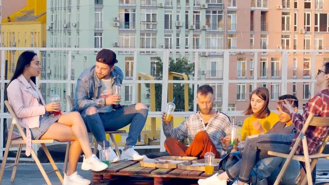 Leisure and people concept - barbecue party and food on the roof in summer