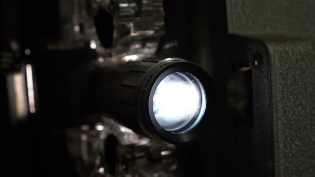 An old movie projector in operation
