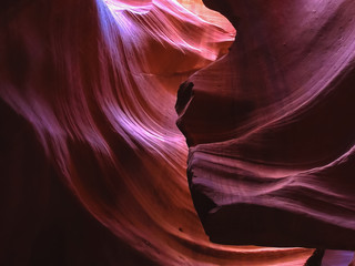 a purple colored rock wall in upper antelope canyon, az © chris