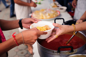 Concept of famine and social inequality : feeding food for beggar poverty concept : The society of helping to share food to the poor : Serving the Homeless Hungry and Poor