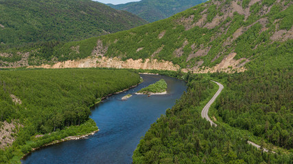 Fototapeta na wymiar Valley Of The Mountain River Anyuy. Khabarovsk territory in the far East of Russia. The view of Anyui river is beautiful. Anyu national Park. Landscape mountain river in the Russian taiga.