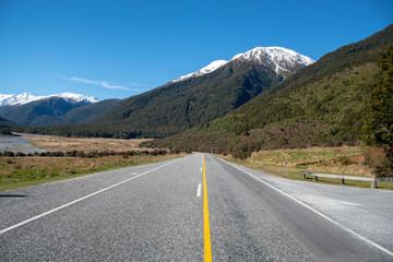 Straight ahead on the highway through theSouthern Alps