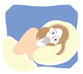 ベッドでスマートフォンを使う女性　イラスト
