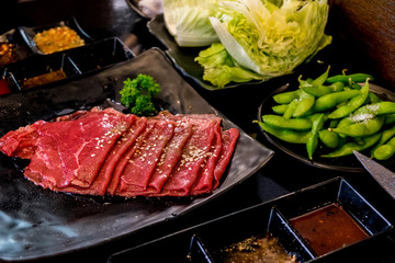 Fresh beef fillet with ingredients in cooking