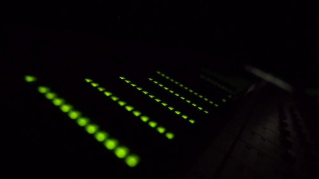 Green light volume equalizer. Recording music and sound.